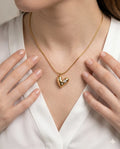 Gold Tone Heart Shaped Pendant Necklace with Crystal Accents
